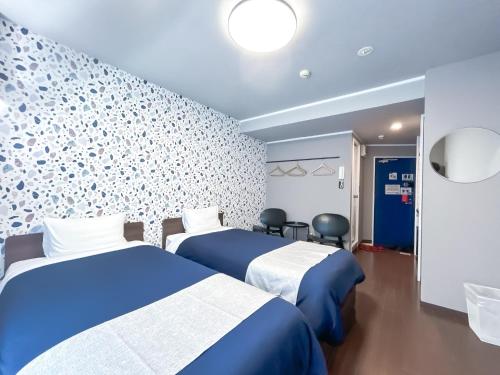 Katil atau katil-katil dalam bilik di Stay Airport - Vacation STAY 76324v
