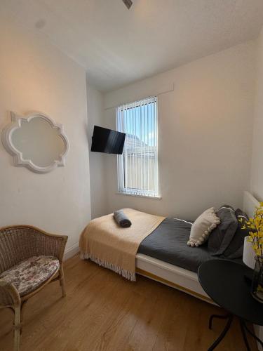 Ένα ή περισσότερα κρεβάτια σε δωμάτιο στο Seaside 3 bedroom Escape Bangor