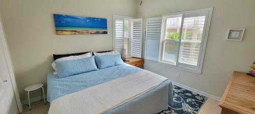 Postel nebo postele na pokoji v ubytování Los Cabos II 4