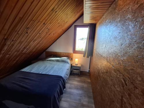 Postel nebo postele na pokoji v ubytování Ti'kaz Bourbon