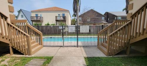 a gate leading to a swimming pool in a house at Mar y Sol II #1 in South Padre Island