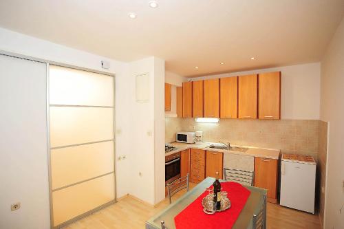 A kitchen or kitchenette at Apartment Mile