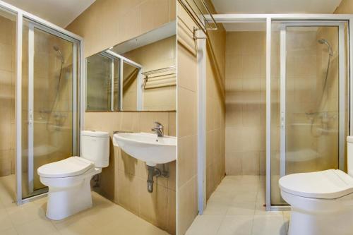 プカンバルにあるCollection O Stefani City Hotelのトイレと洗面台付きのバスルーム