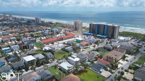 an aerial view of a city next to the ocean at Luxury Remodel - Sleeps 20 - Pool - Go VIP in South Padre Island