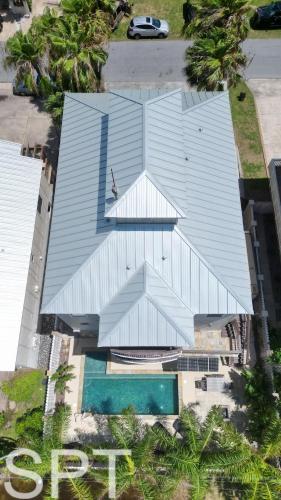an overhead view of a building with a swimming pool at Luxury Remodel - Sleeps 20 - Pool - Go VIP in South Padre Island