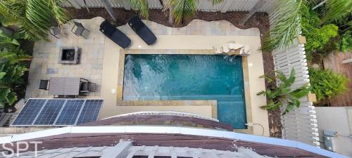 a building with a large window on the side of it at Luxury Remodel - Sleeps 20 - Pool - Go VIP in South Padre Island