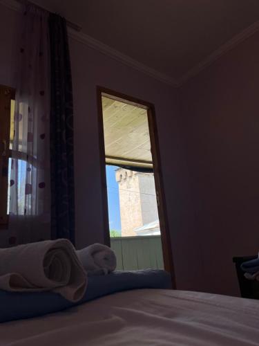 Postel nebo postele na pokoji v ubytování Nanago Guesthouse