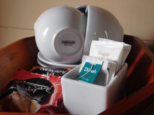 a table with a box of food and a blender at Twin Green in Hatton