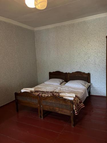 Postel nebo postele na pokoji v ubytování Nanago Guesthouse