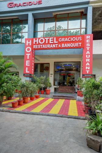 a building with a colorful rug in front of a building at Hotel Gracious - Civil Line in Gurgaon