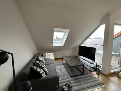 TV a/nebo společenská místnost v ubytování Wohnen im alten Feuerwehrturm