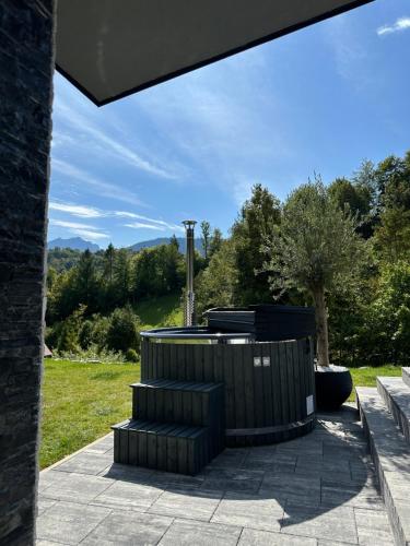 a group of trash cans sitting on a patio at Podhorský Apartmány Terchová in Terchová
