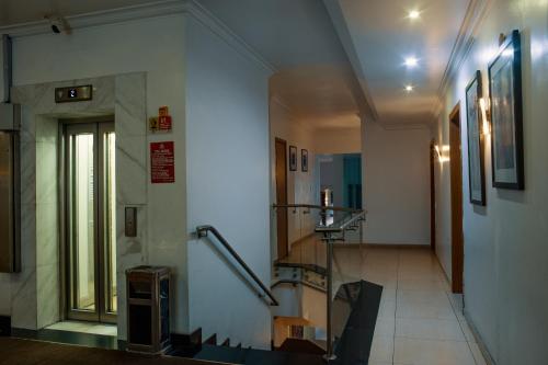 a hallway of a building with a stair case at Morning Side Suites in Lagos