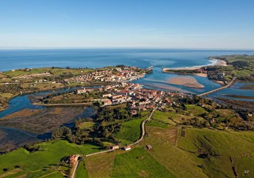 an aerial view of a small town next to the ocean at Casa Taro San Vicente de la Barquera in San Vicente de la Barquera