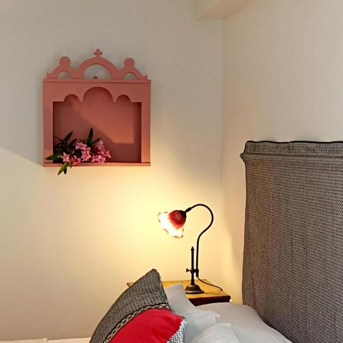 Postel nebo postele na pokoji v ubytování Anemone Residence