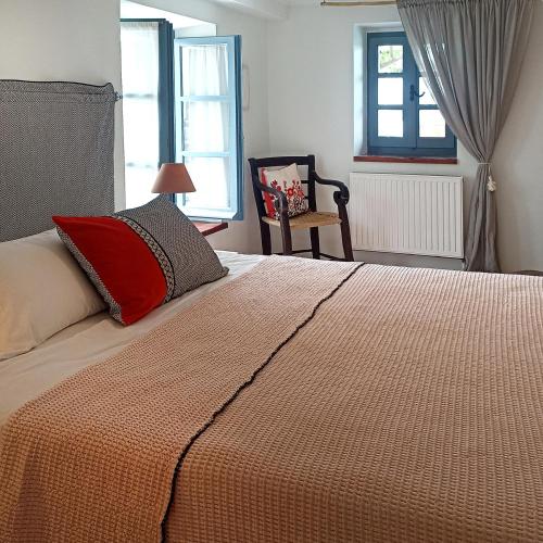 Postel nebo postele na pokoji v ubytování Anemone Residence