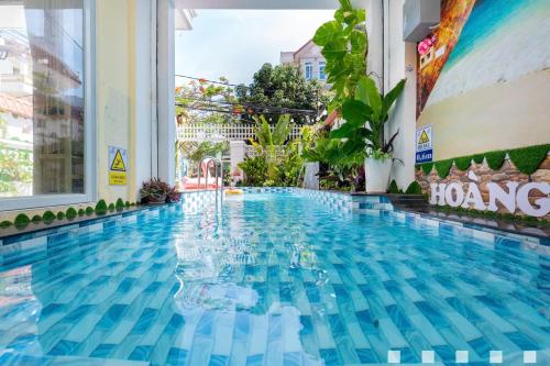 a swimming pool at a hotel in singapore at Villages Hồ Bơi Võ Thị Sáu Lô Góc gần Quảng Trường in Vung Tau