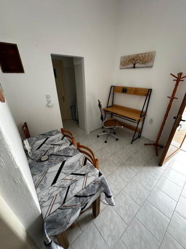Ένα ή περισσότερα κρεβάτια σε δωμάτιο στο Εξοχική Μονοκατοικία με αυλή και εξωτερική αποθήκη-Country house with yard and external warehouse