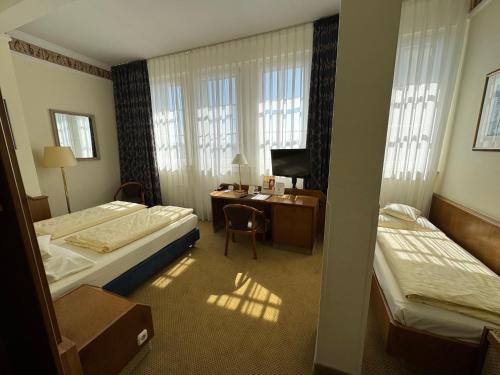 Katil atau katil-katil dalam bilik di Hotel Viktoria