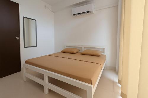 Postel nebo postele na pokoji v ubytování 2-Bedroom Stay in Colombo 05
