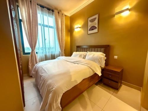 Кровать или кровати в номере Don Onesmo's Duplex A Luxurious Three Bedroom Apartment