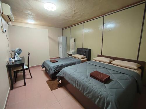 Una cama o camas en una habitación de HotelChanglun
