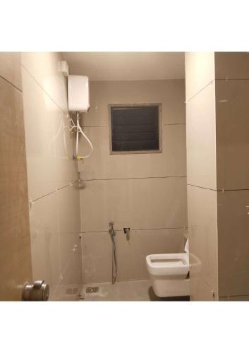 Un baño de Hotel Krishna Park