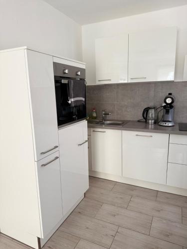 Кухня или мини-кухня в Urban City Room Bad Nauheim
