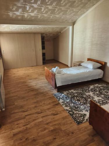 Ένα ή περισσότερα κρεβάτια σε δωμάτιο στο Mase guest house
