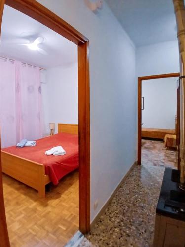 Sanremo Apartments - Ortensiaにあるベッド