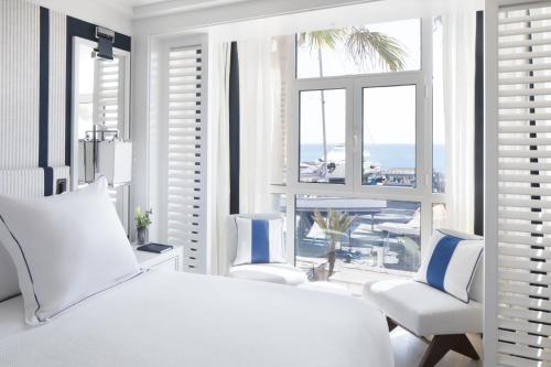 Кровать или кровати в номере Hotel Mim Sotogrande