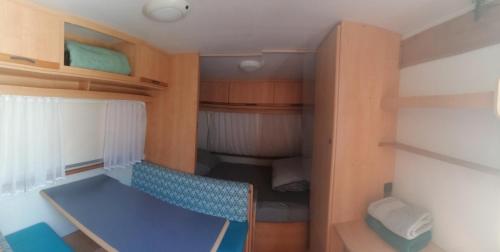an inside view of a cabin in a boat at Charmante maison près de la mer in Asnelles