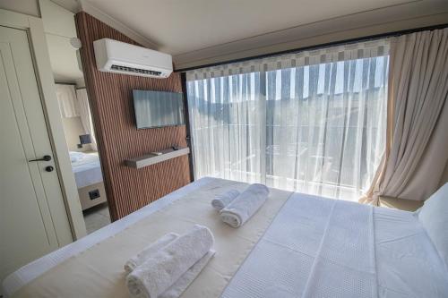 Ένα ή περισσότερα κρεβάτια σε δωμάτιο στο Villa The Bay