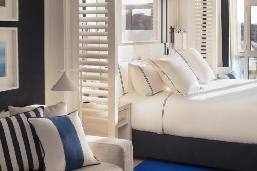 Кровать или кровати в номере Hotel Mim Sotogrande