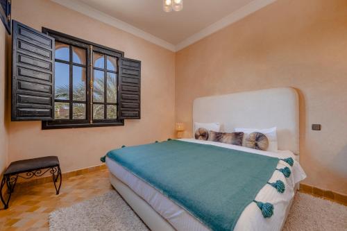 Postel nebo postele na pokoji v ubytování Residence Dar Lamia Marrakech