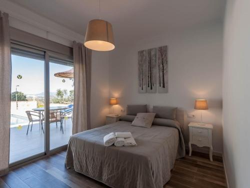 Katil atau katil-katil dalam bilik di Villa 8 by Villamya