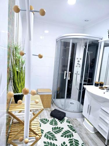 a bathroom with a shower and a sink at Villa Alpine Spirit in Gösing an der Mariazeller Bahn