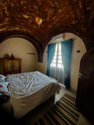 Ένα ή περισσότερα κρεβάτια σε δωμάτιο στο FairHaven Apartments