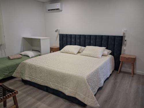 Ένα ή περισσότερα κρεβάτια σε δωμάτιο στο SOUTELO House