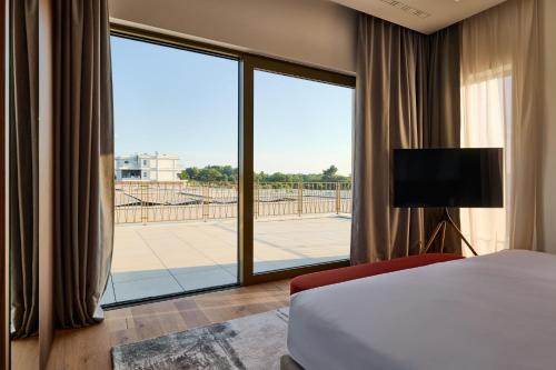 Postel nebo postele na pokoji v ubytování Taria Resort