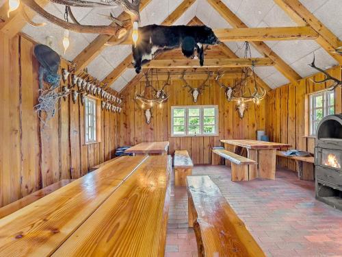 a large room with a large wooden table in it at 5 star holiday home in Gram in Gram