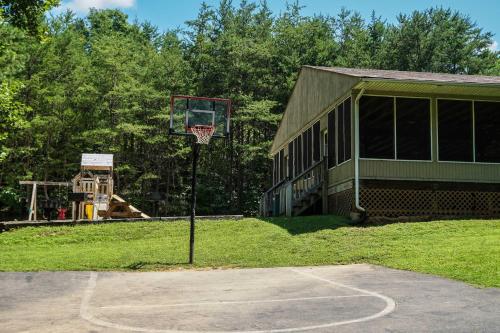 a basketball hoop in front of a building at Cozy Bear in Gatlinburg