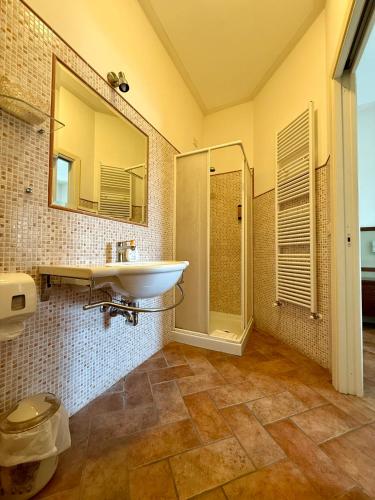 a bathroom with a sink and a shower at Casale Malva in Narni