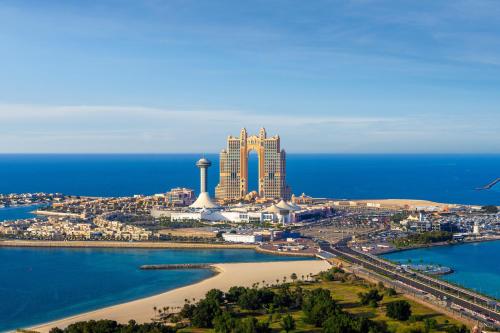 a view of the mgm resort from the ocean at Rixos Marina Abu Dhabi in Abu Dhabi
