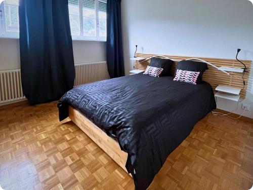 Postel nebo postele na pokoji v ubytování Elegant Vaudois