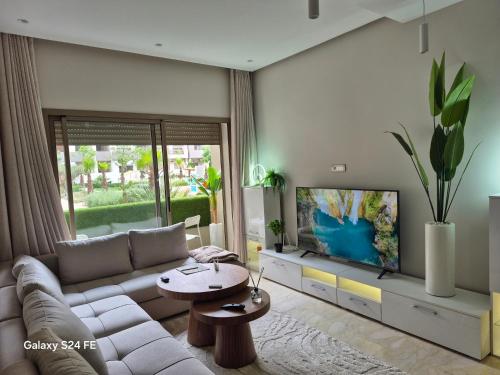 TV a/nebo společenská místnost v ubytování Aeroperla Prestige Casablanca Airport