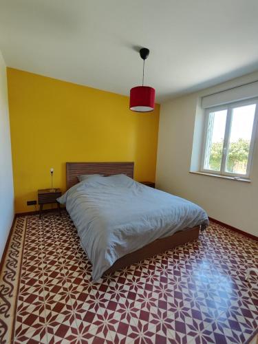 Llit o llits en una habitació de Maison Clos Jacques