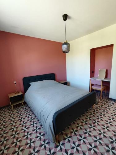 Llit o llits en una habitació de Maison Clos Jacques