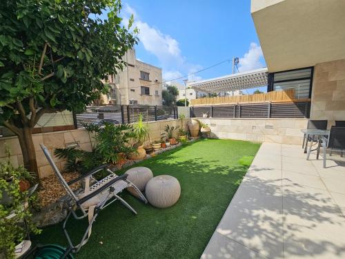 Zahrada ubytování Luxury Duplex • 3BR • Garden + Balcony • Parking