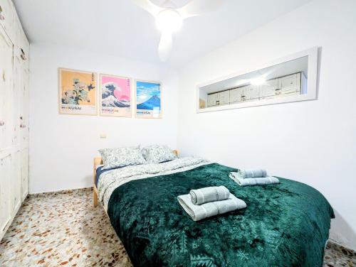 En eller flere senge i et værelse på Casa Maritimo Centro Historico